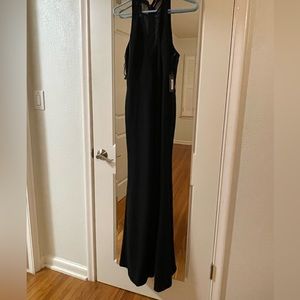 Vera Wang size 6 dress. New with tags. Mesh V neck and slit up center